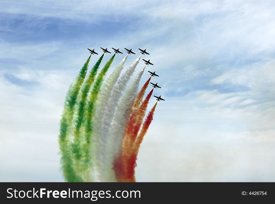 The italian acrobatic patrol Frecce Tricolori cross the sky