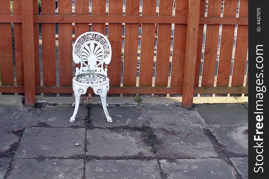 Chair Against the Fence
