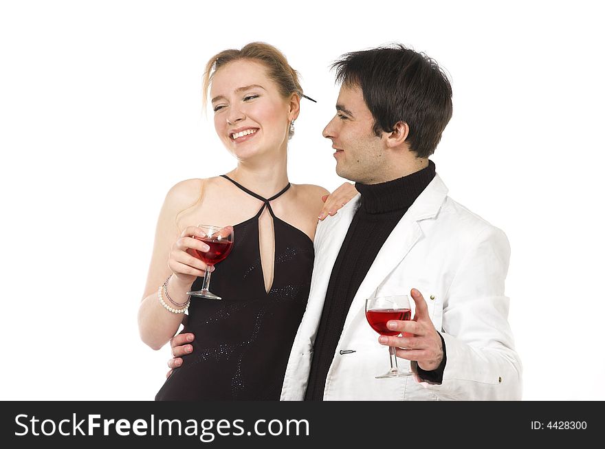 The man and the woman in white clothes with red wine