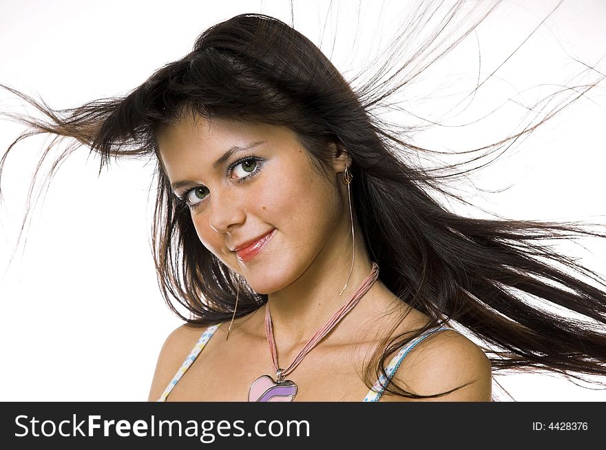 The beautiful brunette with in flying hair. The beautiful brunette with in flying hair