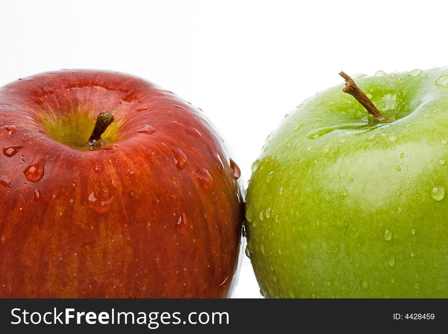 Two wet apples with white background