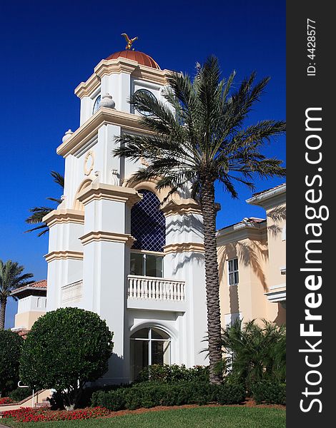 Tropical Tower in south Florida with palm trees