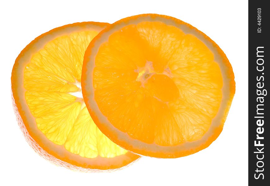 Two slices of orange isolated on white