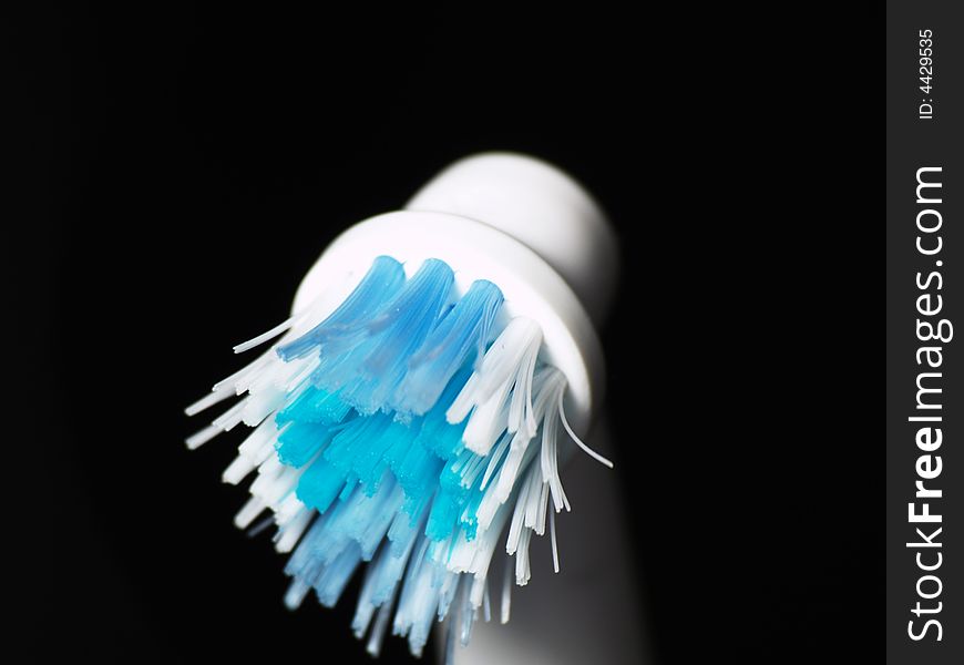 A closeup of a toothbrush,