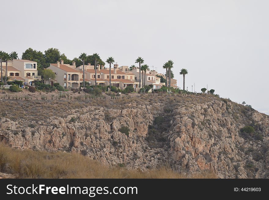 A group of Spanish houses on top of the hill in Alicante. A group of Spanish houses on top of the hill in Alicante