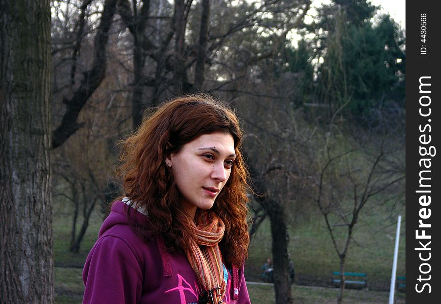 Portrait of a beautiful girl in a park