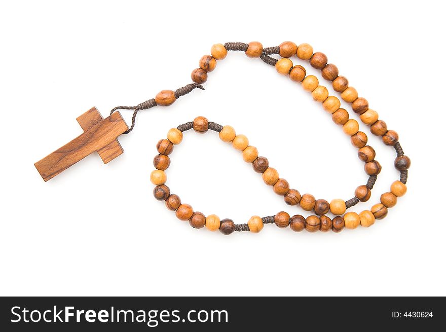 Wooden rosary isolated over white