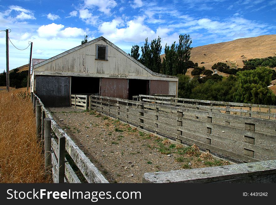 Barn or paddocks on a sheep ranch/farm in New Zealand. Barn or paddocks on a sheep ranch/farm in New Zealand