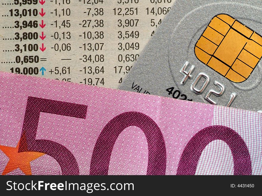 Pile of euros: 500 with financial journal and credit card. Pile of euros: 500 with financial journal and credit card