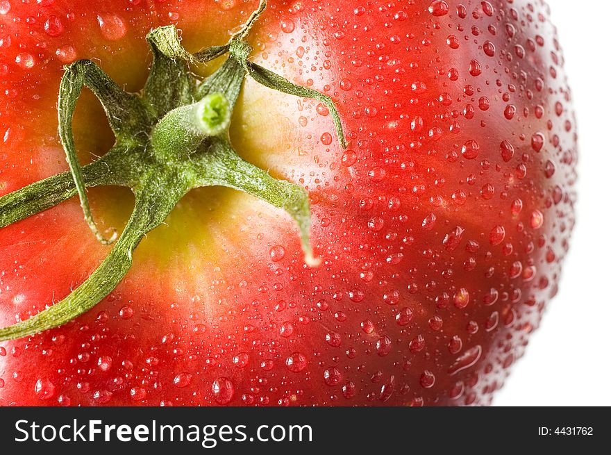 A Fresh Red Apple With Tomato Twig