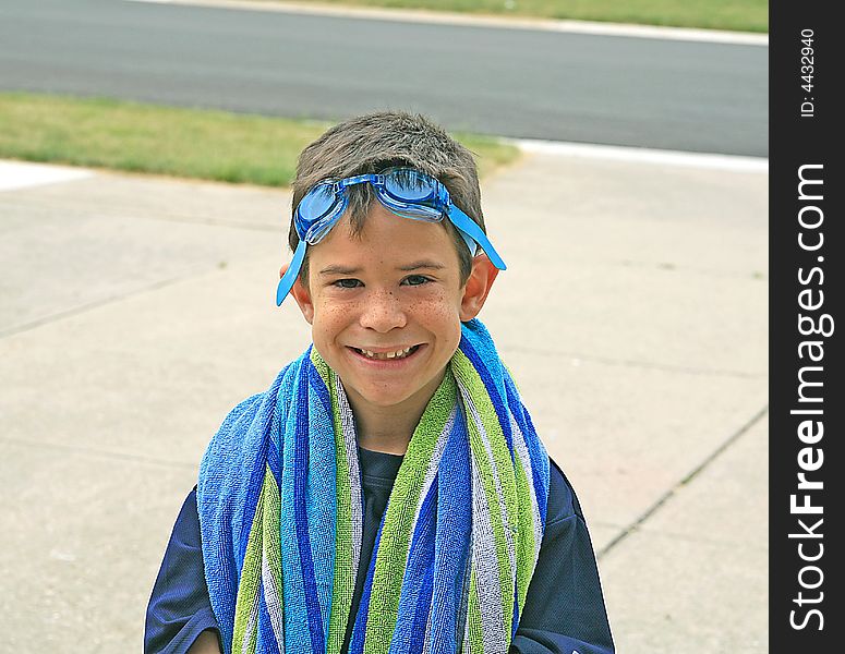 Boy Ready for Swimming With Beach Towel. Boy Ready for Swimming With Beach Towel