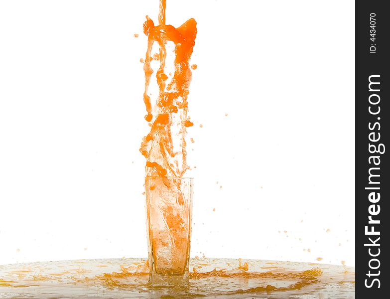 Splashing orange juice on white background. Splashing orange juice on white background