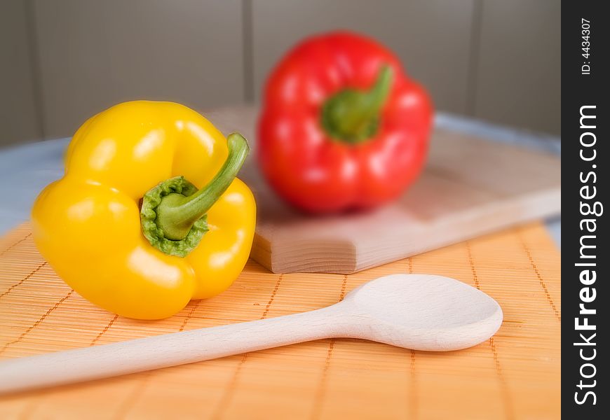 Yellow and red paprika in a kitchen