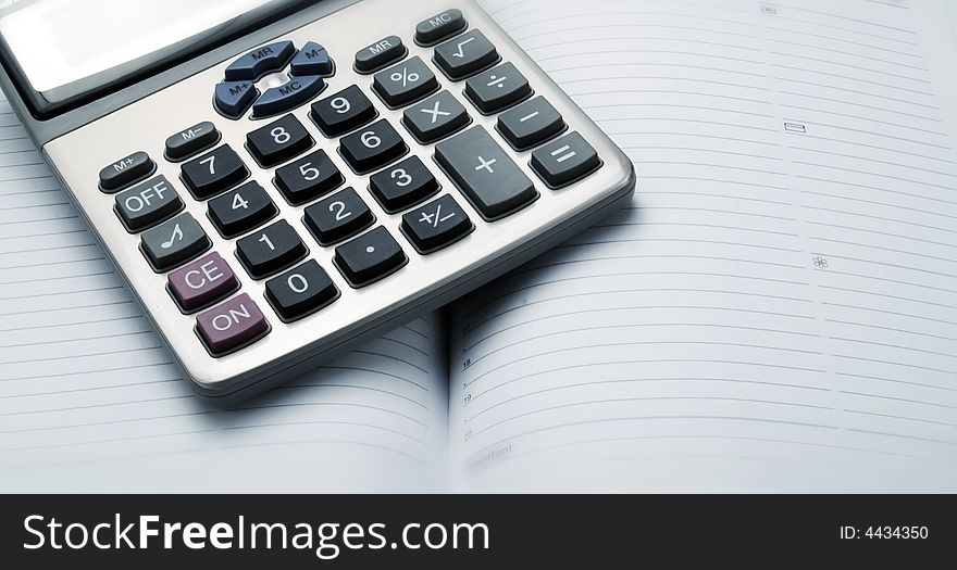 Calculator in an office with shallow depth of field