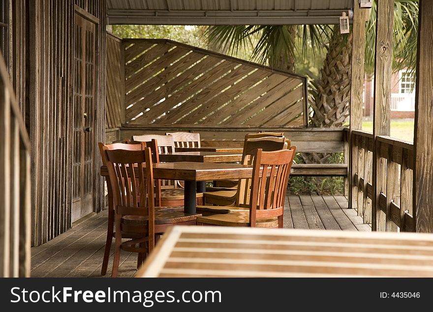 An outdoor patio with seating at a casual restaurant. An outdoor patio with seating at a casual restaurant