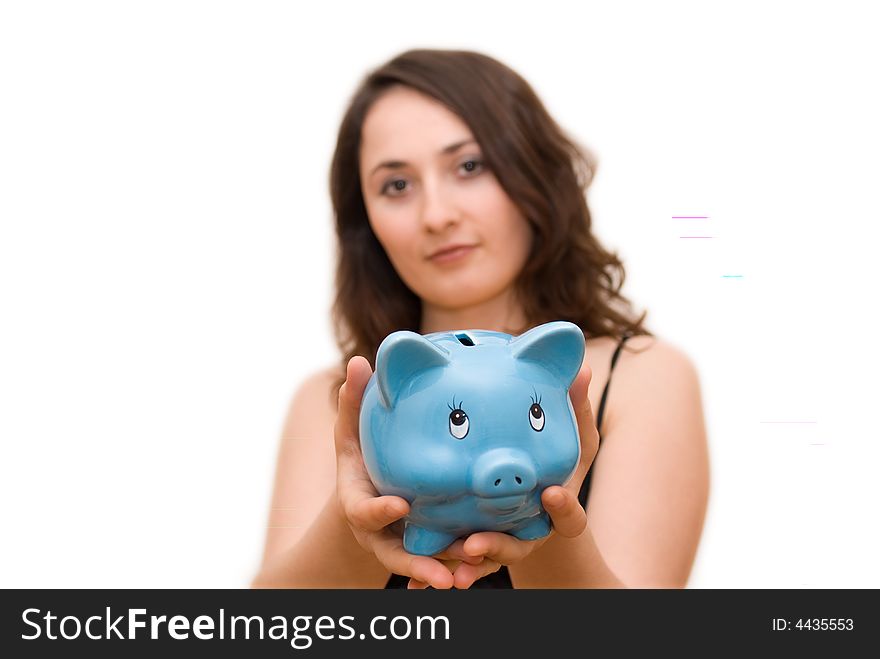 A young attractive woman with blue piggy-bank. A young attractive woman with blue piggy-bank