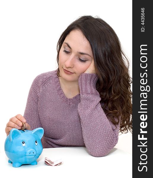 A young attractive woman with blue piggy-bank. A young attractive woman with blue piggy-bank