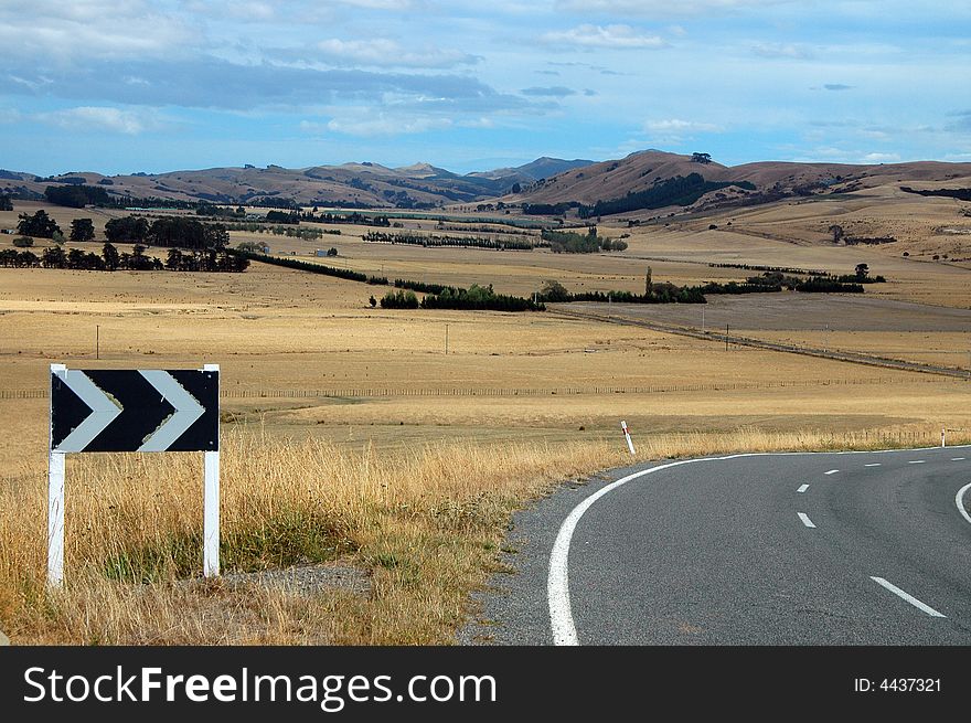 Bending turn on a rural highway in New Zealand. Bending turn on a rural highway in New Zealand