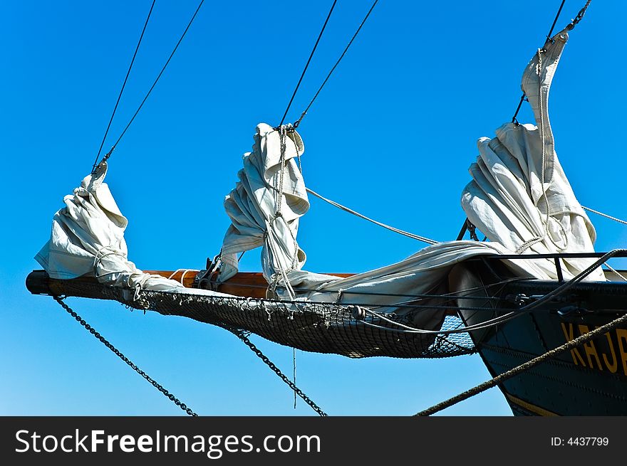 Sailing boat anchored to the shore on a summer day. Sailing boat anchored to the shore on a summer day