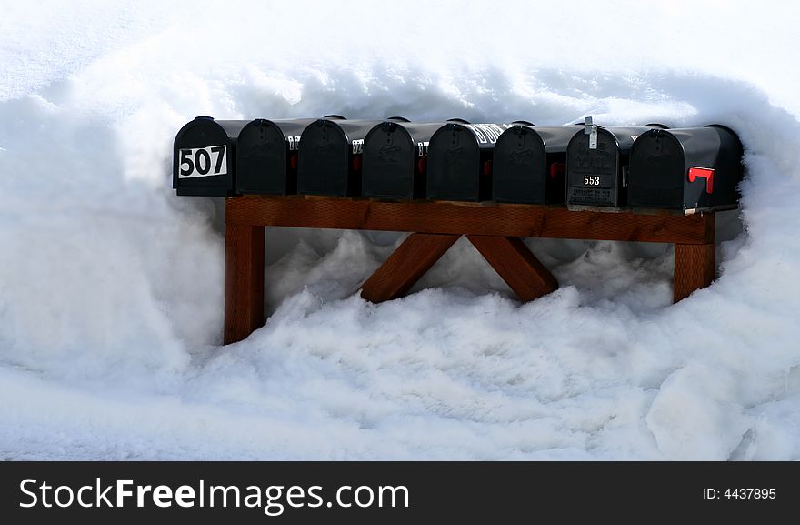 Row of mail boxes in mid winter Idaho. Row of mail boxes in mid winter Idaho