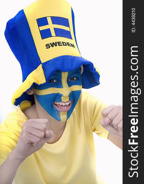 Swedish girls with patriotic face paint as a sports fan. Swedish girls with patriotic face paint as a sports fan