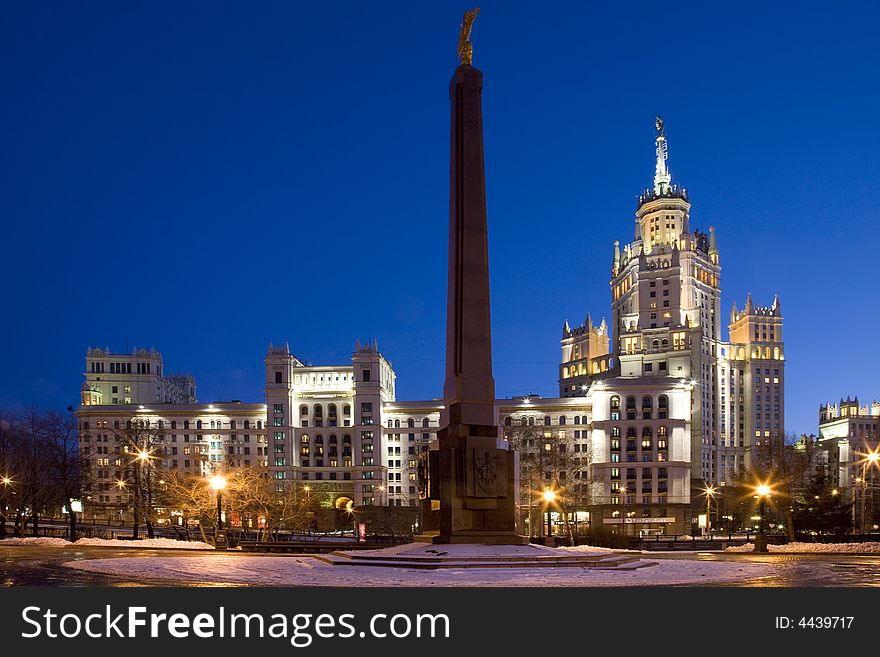 Stalin skyscraper in Moscow evening.