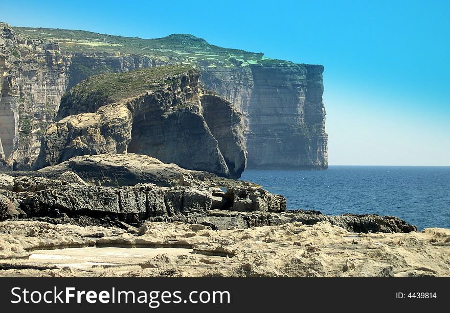 Formations of limestone rock surround the island of Gozo, Malta. Formations of limestone rock surround the island of Gozo, Malta