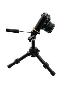 Photographing . Black Tripod And Camera Royalty Free Stock Photo