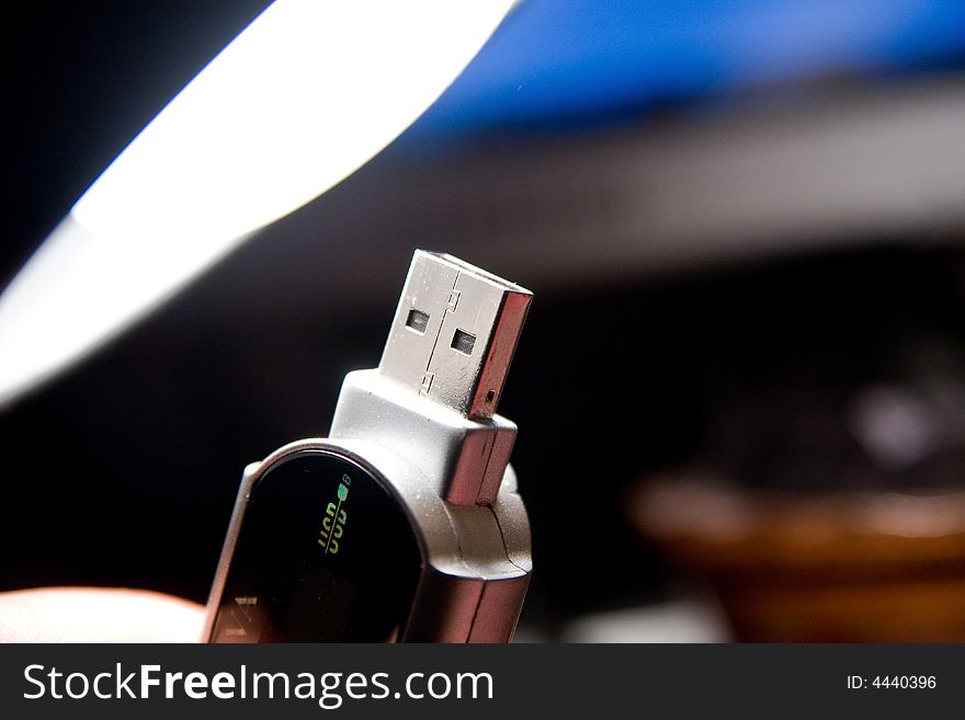 Usb Stick And Mp3 Player And Bulb