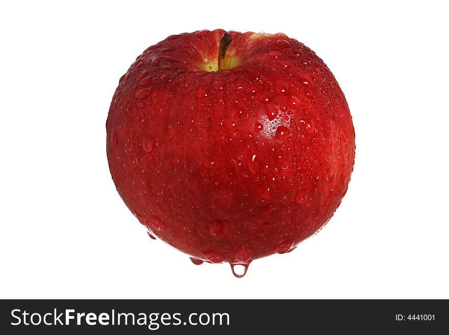 Red apple with drops of water free-standing, isolated on white