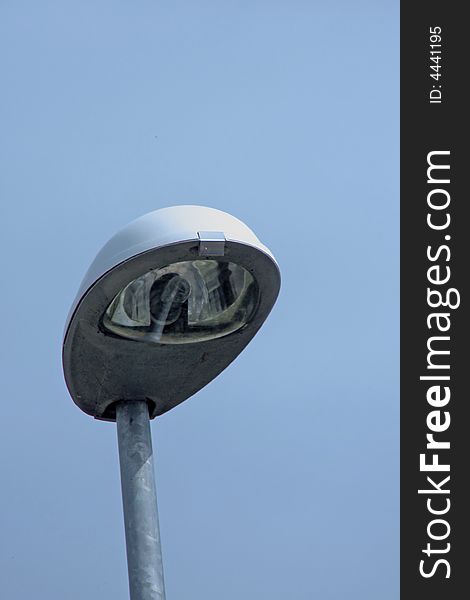 Street lamp, top end on the clear blue sky background (with space for text)