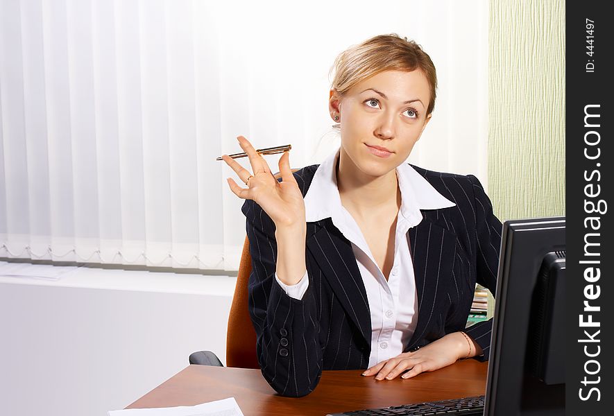 The business woman in an office