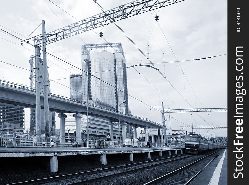 Railway platform, road and offices building toned. Railway platform, road and offices building toned.