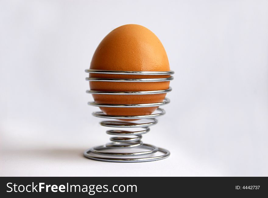 Boiled egg in silver stand. Boiled egg in silver stand.