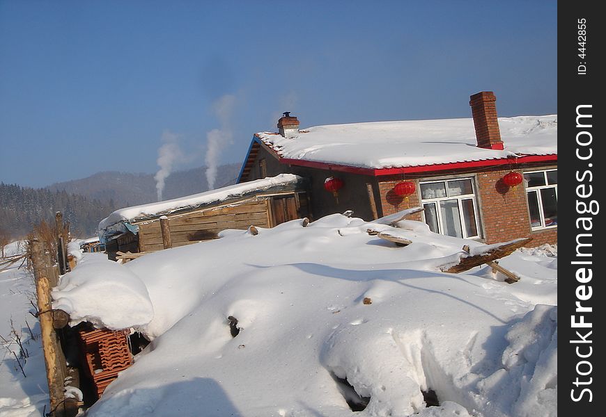 A chinese house in the snow forest near Shen-Yang, a city in northeastern China