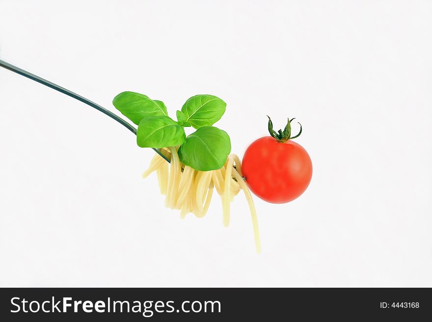 Spaghetti on fork on bright backgrund
