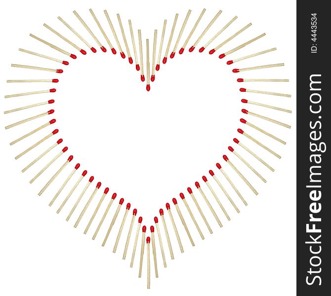 Big heart made of matchsticks on white background