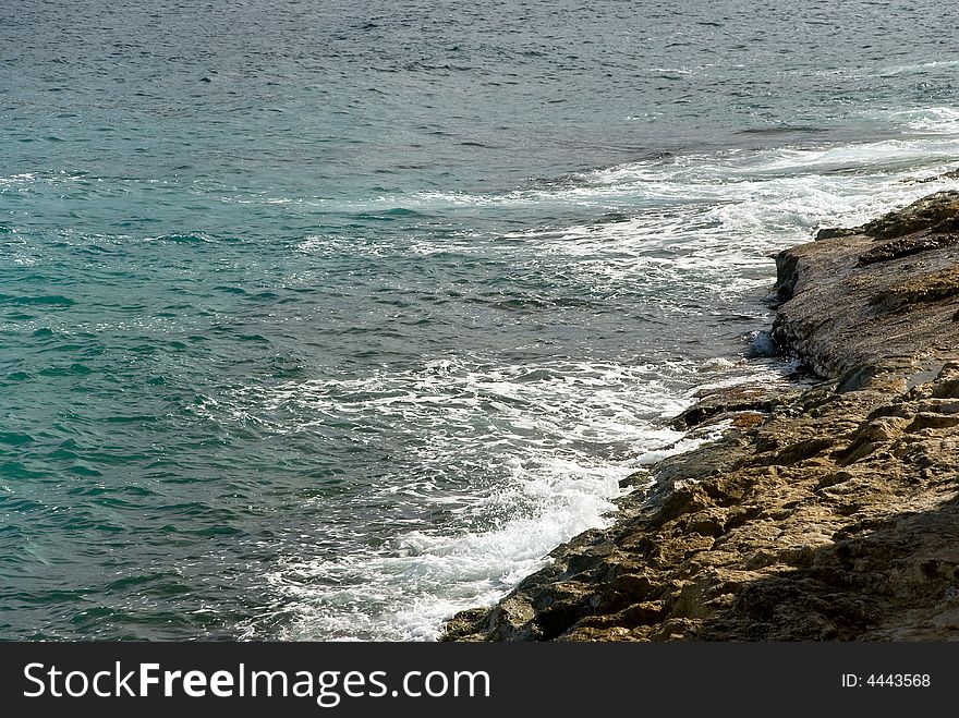 A sea view with cliffs