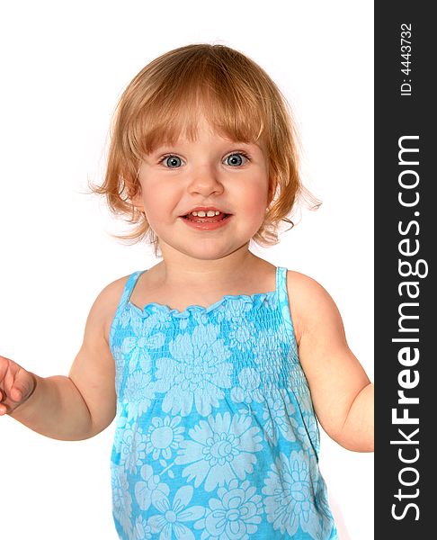 The little girl poses in in blue dress on white background. The little girl poses in in blue dress on white background