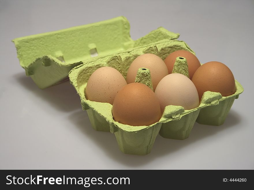 Eggs in an egg box.