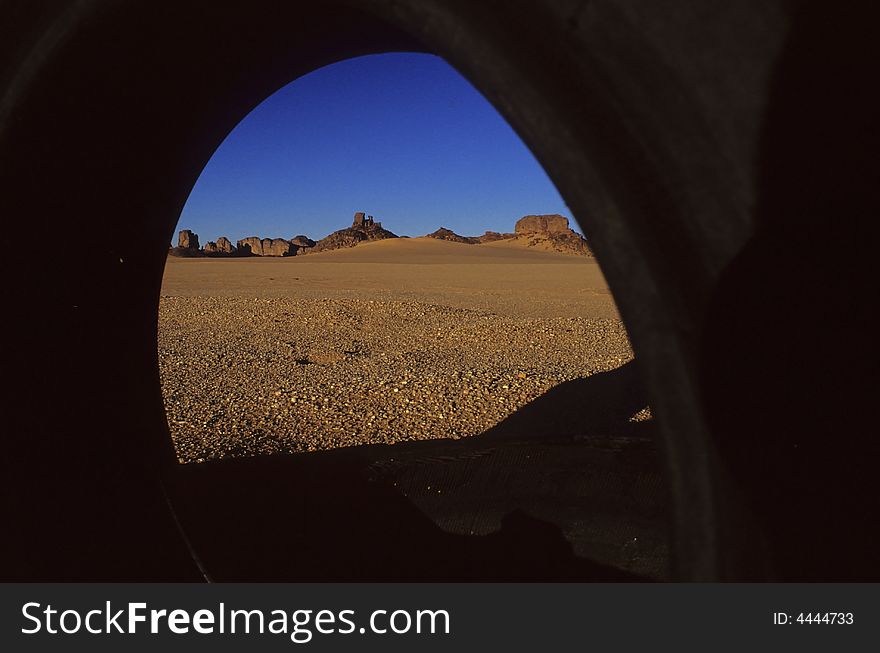 Tires at the roadside of an Algerian desert piste. Tires at the roadside of an Algerian desert piste