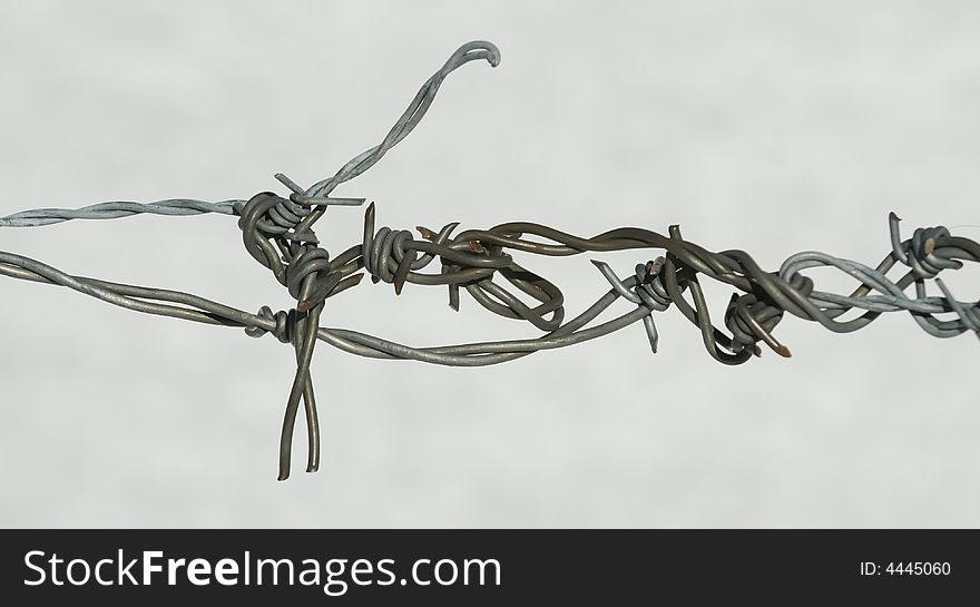 Barbwire with ice crystals and snow. Barbwire with ice crystals and snow