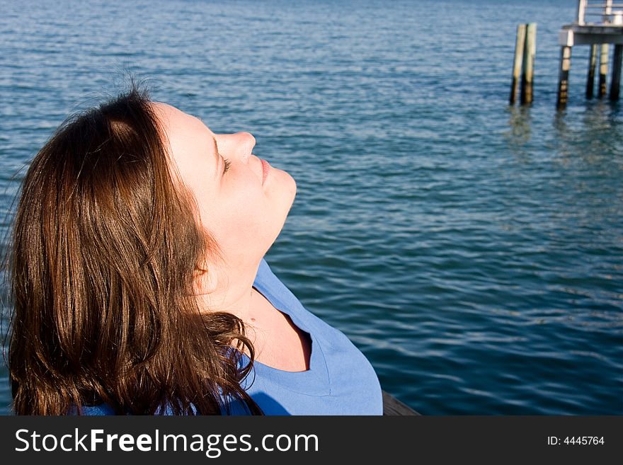 Beautiful plus sized model soaking up the sun on vacation.