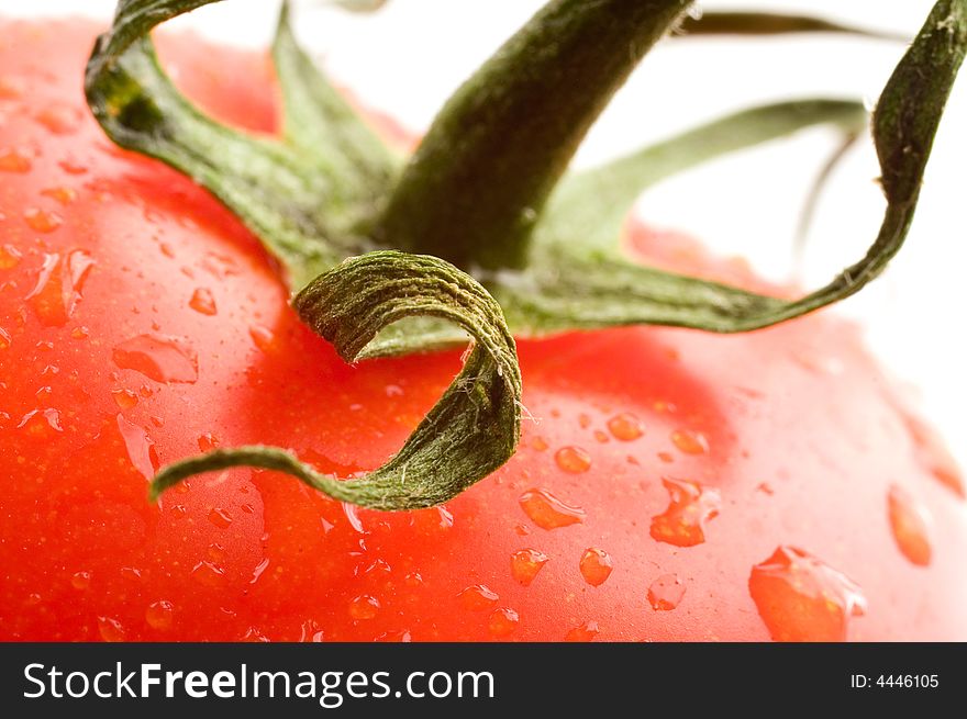 A part of red fresh tomato. A part of red fresh tomato