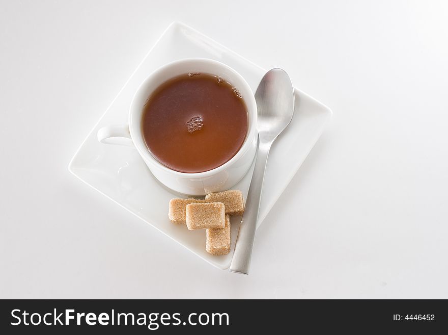 Top view of a cup of fleshly brewed tea isolated on white background. Top view of a cup of fleshly brewed tea isolated on white background.