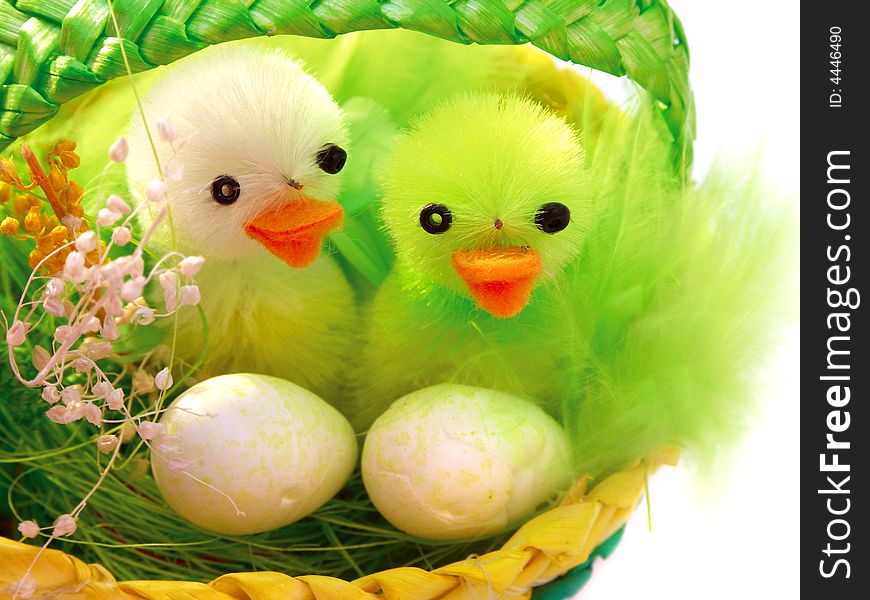 Two ducks in the Easter basket.