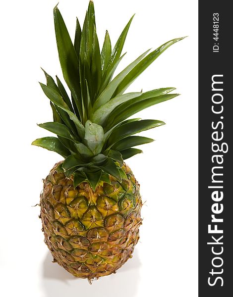 Fresh pineapple before a white background