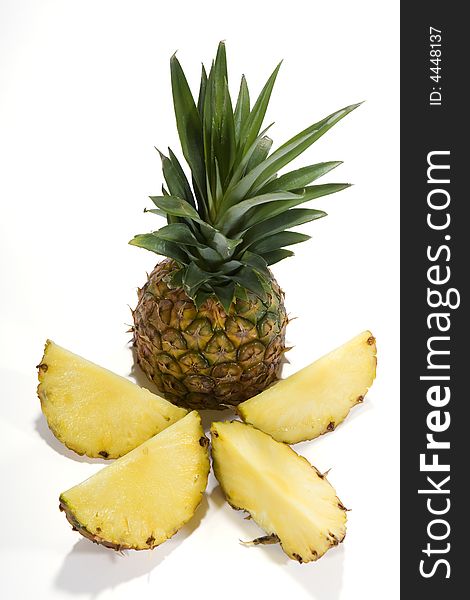 Fresh pineapple before a white background