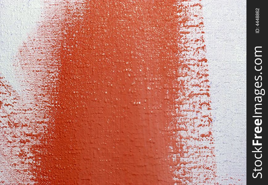 Wet fresh red paint on a wall