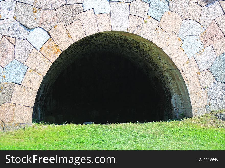 Modern cave or opening to tunnel